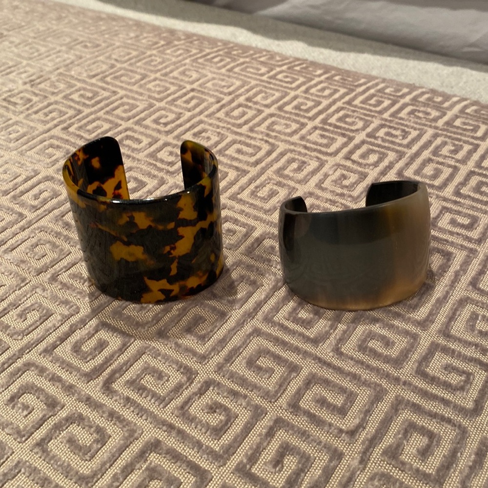 2 Cuff bracelet. One horn design. One tortoise design.